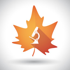 Isolated orange leaf with  a microscope icon