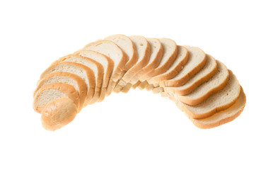 cut pieces of white bread on a white background