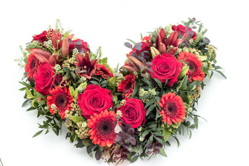 olorful flower arrangement wreath for funerals isolated on white