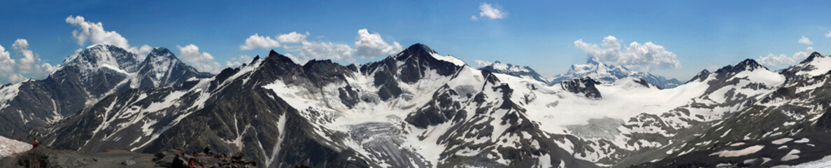 Great panorama of beautiful snow mountain range of Caucasus in E