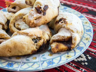 traditional romanian dessert coltunasi cornulete dumplings with jam or turkish delight 