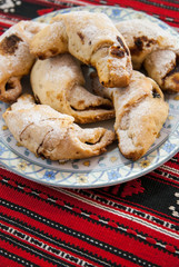traditional romanian dessert coltunasi cornulete dumplings with jam or turkish delight 