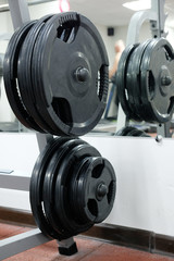 The image of wights in a fitness hall