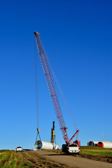 construction of towers for wind tubines, part of another wind farm to generate clean energy in ND.