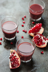 Ripe pomegranates with juice