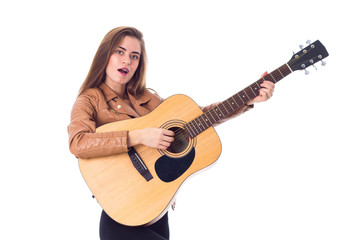 Fototapeta premium Young woman holding a guitar 