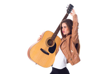Obraz premium Young woman holding a guitar 
