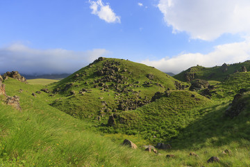 Green hill with rocks (Caucasus)
