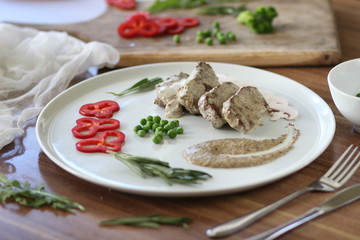 meat with sauce and vegetables
