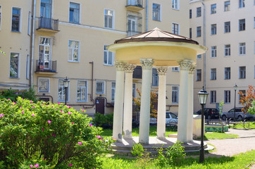 The rotunda stands in the yard.