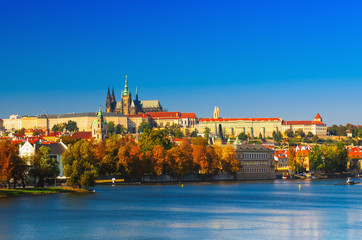 Obraz premium Prague Castle and Old City day view with blue sky, travel vivid autumn european background