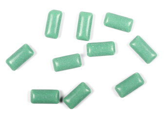 green chewing gum isolated on white