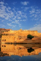 Fotobehang Vestingwerk Amber Fort reflected in Maota Lake near Jaipur, Rajasthan, India