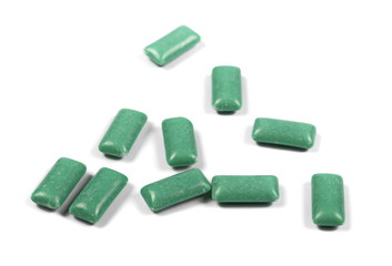 green chewing gum isolated on white