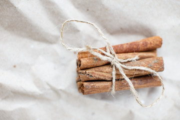 cinnamon sticks on kraft background