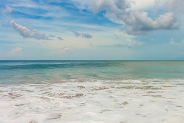 Fototapeta na wymiar Beach in Bali called Dreamland. Shore line and waves