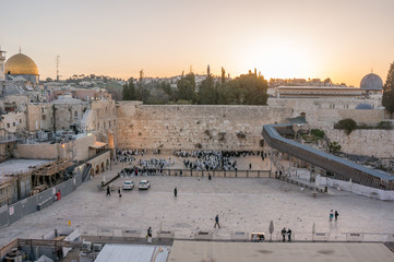 Fototapeta premium Sunrise over the Old City of Jerusalem Israel near the western wall and the dome of the rock