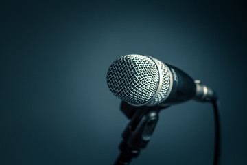 Microphone on dark background, close-up