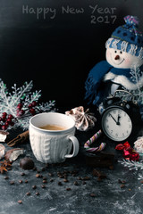 Christmas snowman, cup of coffee, sweets, meringues and coffee b