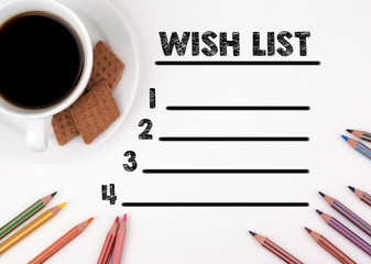 Wish List. White desk with a pencil and a cup of coffee.