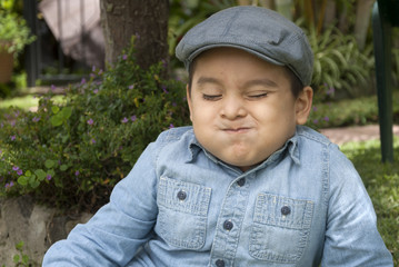 Boy in cap guatemalan latin expression