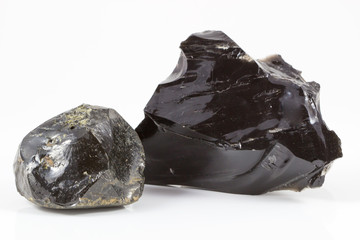 Black stone on white background.