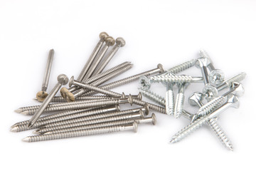 Bunch of inox nails and screws close up