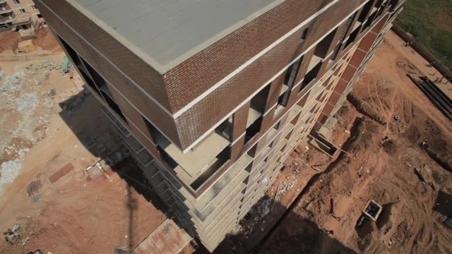 Industry construction and development.Aerial shot,the camera moves down close to the building