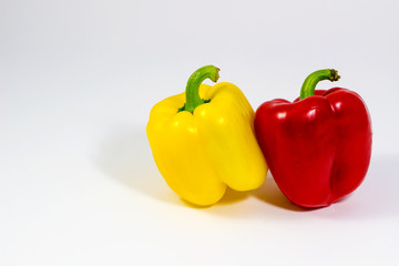 Fresh peppers isolated on white background / red and yellow fresh peppers on white background.