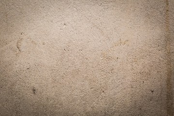 Old destroyed concrete wall with uneven structure