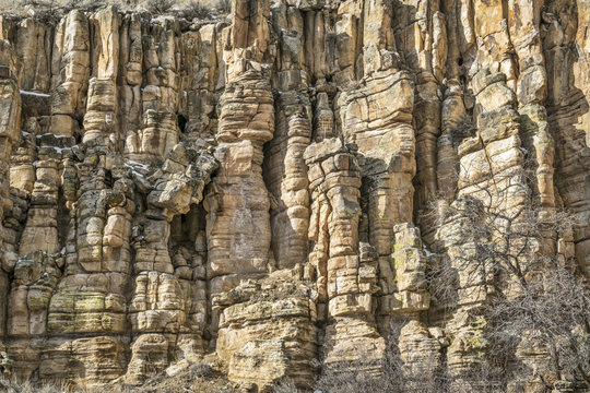 Sandstone Cliff With Columns And Pillars