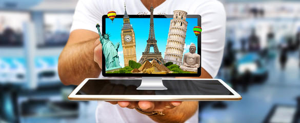 Man travelling the world with his computer