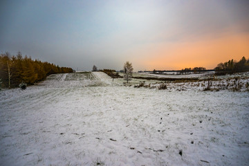 snow on the fields in the night