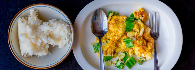 Thai style omelet mixed with Japanese onion  bunch serve with Japanese rice