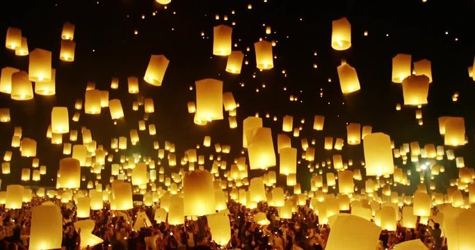 Lanterns floating in night sky at Yi Peng Festival. Chiangmai, Thailand. 4k