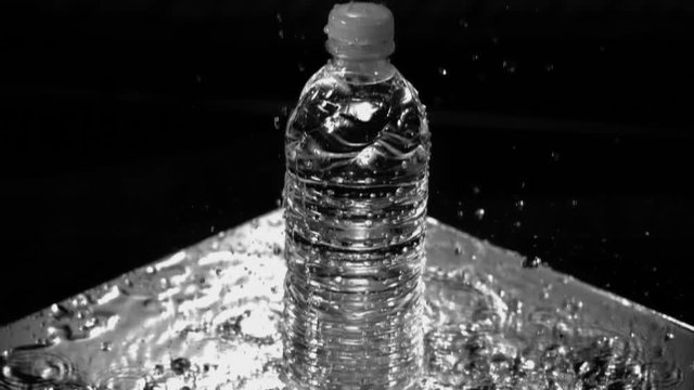 Silver Water Bottle Splash Slow Motion 04