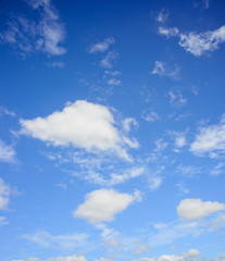 Obraz na płótnie Canvas white fluffy clouds in the blue sky