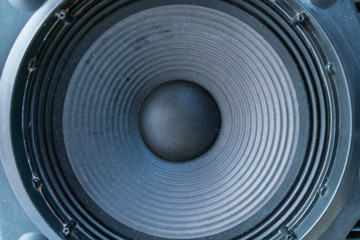 Frontal image audio speaker with undulating membrane.
speaker close up - Music, Volume concept.