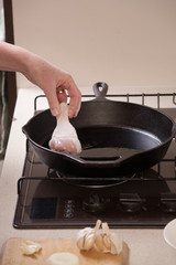 Frying chicken drumsticks