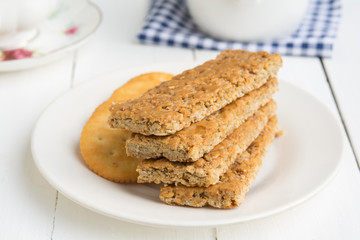 Peanut Butter Cookies and bread in white plate on food table