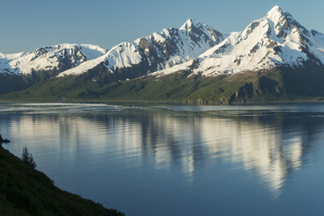 Naklejka na ściany i meble Mountains reflecting in Aialik Bay, Kenai Fjords National Park,