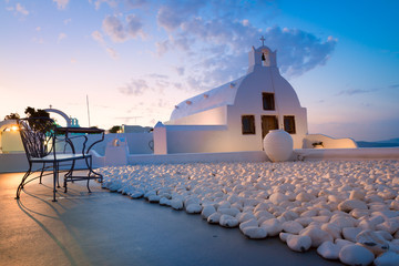 Local church in Oia village in Santorini Island early in the mor © tilialucida