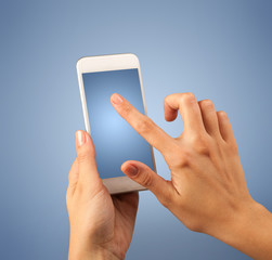 Female hand holding smartphone