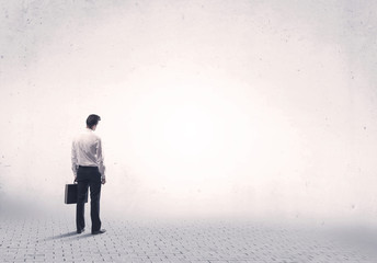 Elegant person standing with his back