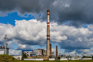 Fototapeta na wymiar power station on a background of clouds 