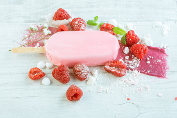 Obraz na płótnie Canvas Raspberry ice cream on wooden table 