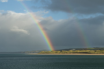 Double rainbow over the sand dunes in Portrush, Northern Ireland