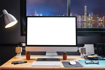 Graphic Designer Workspace with city night view