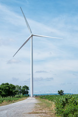 Fototapeta na wymiar Wind turbine power at daylight
