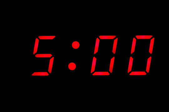 Digital clock showing 5:00 o'clock Stock Photo | Adobe Stock